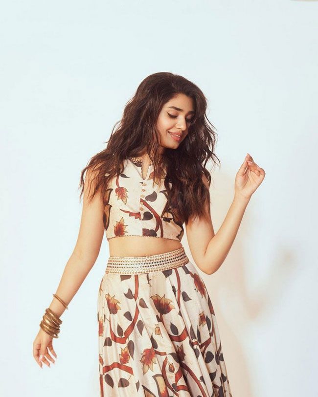 Krithi Shetty Staggering Poses In White Saree